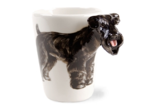 Featured here on this Blue Witch ceramic is the one and only, unmistakable Schnauzer. It has a unique and smartly distinctive look, with its compact, square build and beard. This adorable dog has its ancestral roots in the old guarding and herding dogs of Europe.