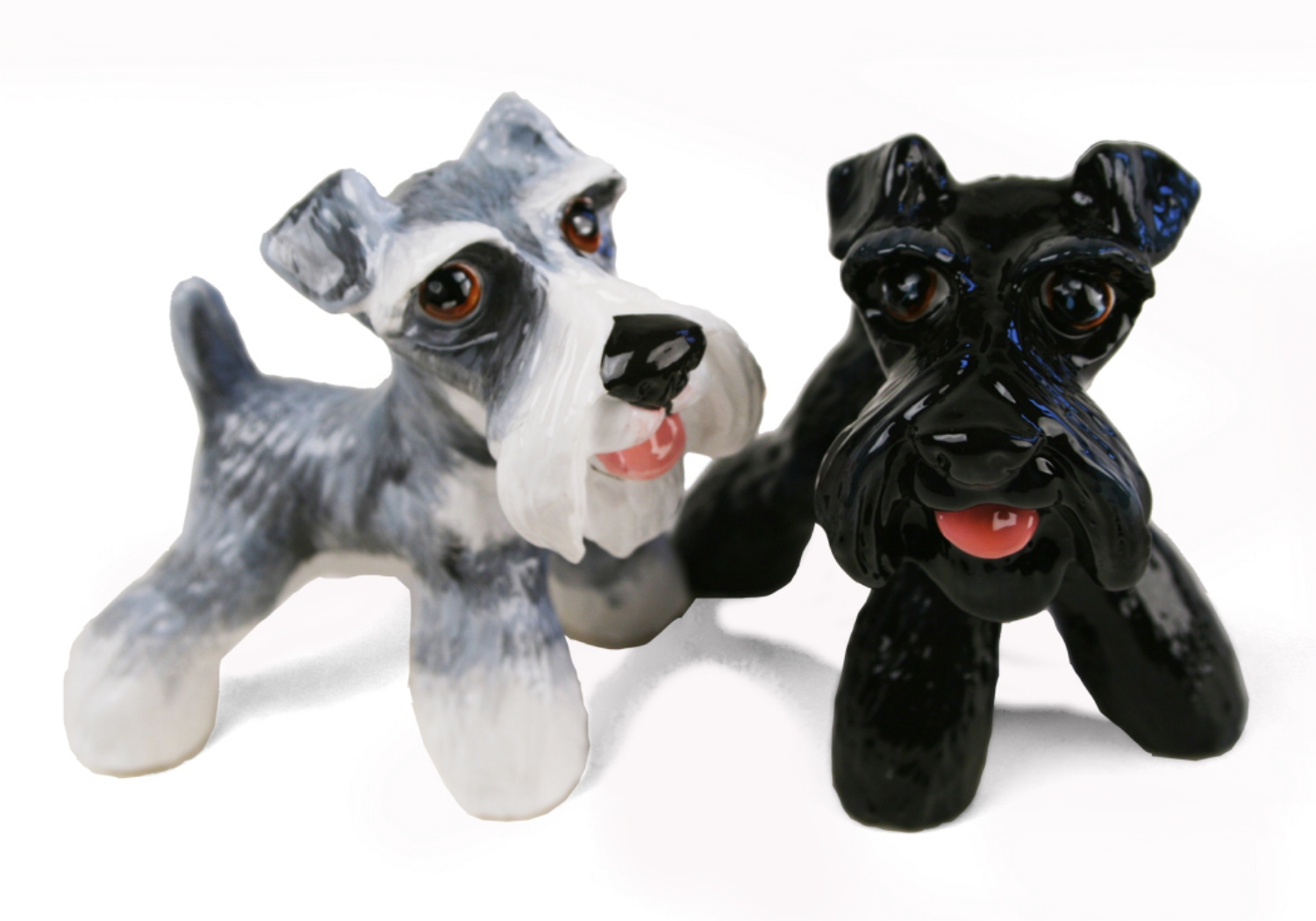 Featured here on this Blue Witch ceramic is the one and only, unmistakable Schnauzer. It has a unique and smartly distinctive look, with its compact, square build and beard. This adorable dog has its ancestral roots in the old guarding and herding dogs of Europe.