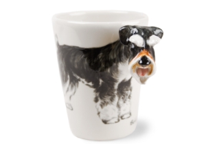 Featured here on this Blue Witch ceramic is the one and only, unmistakable Schnauzer. It has a unique and smartly distinctive look, with its compact, square build and beard. This adorable dog has its ancestral roots in the old guarding and herding dogs of Europe.