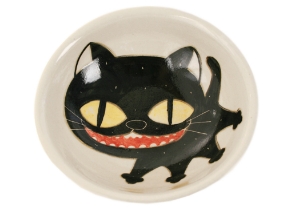 An eye catching feline takes the starring role on our Blue Witch Coraline ceramic collection.Each Bowl is ingeniously hand illustrated by a prolific artist. The canny brush strokes and cunning design create a curiosity with an air of mystery. Each piece is hand tooled to form a slightly eccentric asymmetrical shape. Visually and audibly theatrical whilst great for everyday use, dishwasher safe and microwave friendly to guarantee the colour will never fade.  It will also add a magical charm to a dinner party. Guaranteed to make the kids ‘Meow’ with delight and full of joie de vivre at any fun theme party!