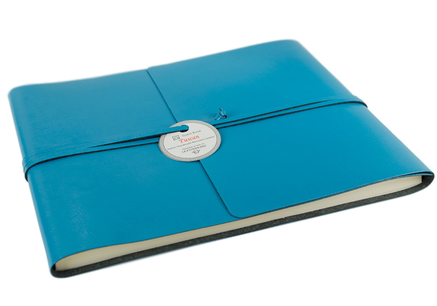 Representative of Tuscany in all its glory. The passion and skill of our Italian master craftsmen are utilised to produce the Tuscan collection, an environmentally friendly option which is still a fun yet glamorous choice. Specially developed by Italian expertise for LEATHERKIND ® Handmade in Florence using a new innovative technology: this natural recycled leather Guest Book has a smooth glossy finish which still allows for flexibility. A range of tasteful colours has been carefully selected; chocolate, burgundy, sky blue, black and red. These shade express are evocative of strength whilst remaining cheerful to look at. The envelope wrap style delivers an enduring, handsome look.