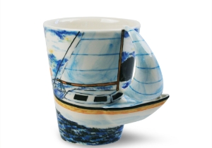 This original Blue Witch ceramic depicts a typical Bermuda rigged sloop sailing Yacht. A Bermuda's main characteristic is its ability to sail close hauled to the wind making them popular with yachtsmen for their simple handling, manoeuvrability and speed.