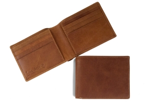 Casual yet distinctive. This handsome leather Slim Boy billfold wallet with flap is the classic combination of functionality and practicality making it the perfect every-day accessory. Handmade from high-quality calf leather. It has been produced to the high standard to give the wallet a great form and stability.