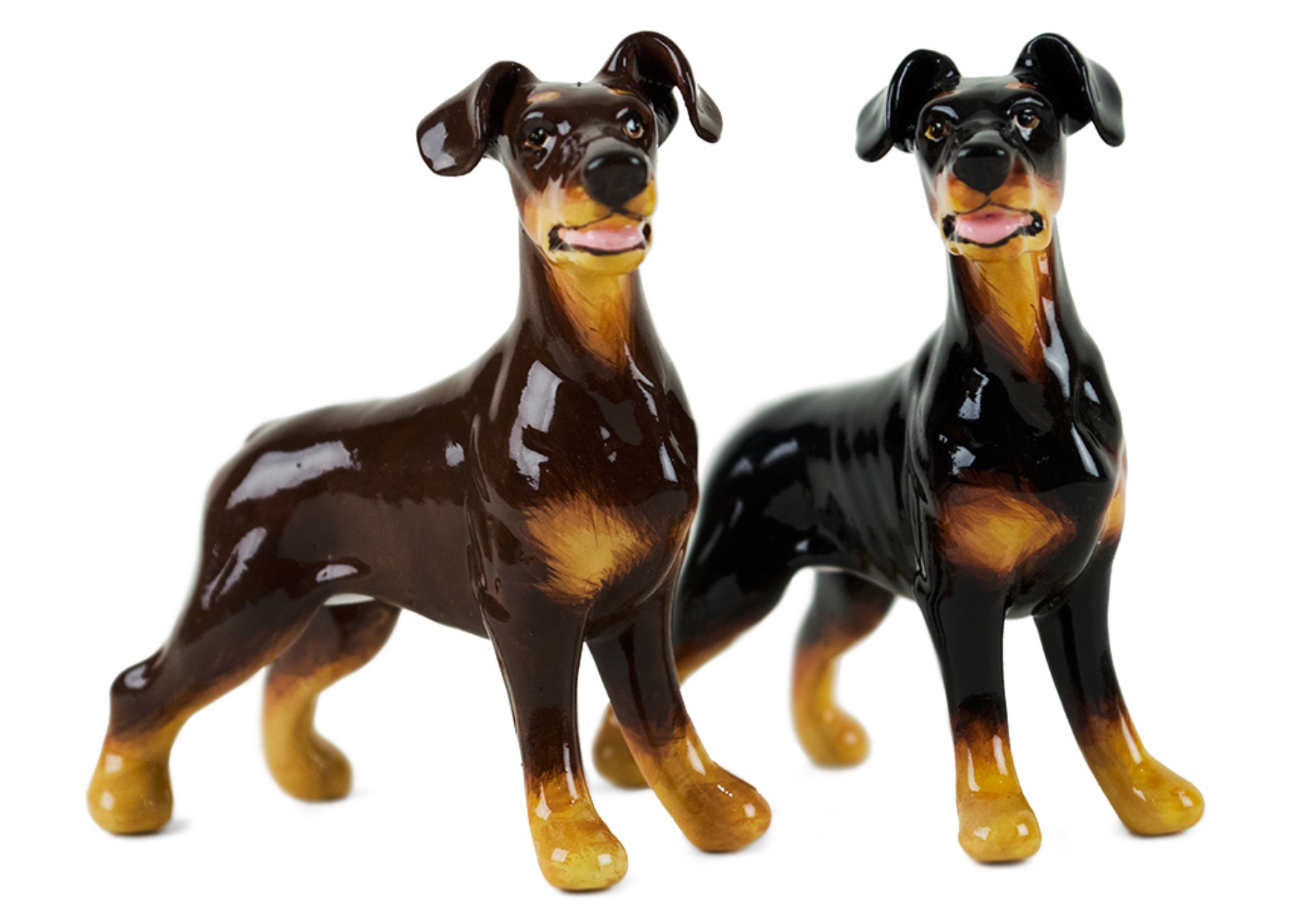 A beautiful handmade Blue Witch ceramic featuring the sleek and elegant Doberman. This fearless animal is renowned for its prowess as a guard dog.