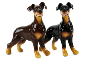 A beautiful handmade Blue Witch ceramic featuring the sleek and elegant Doberman. This fearless animal is renowned for its prowess as a guard dog.