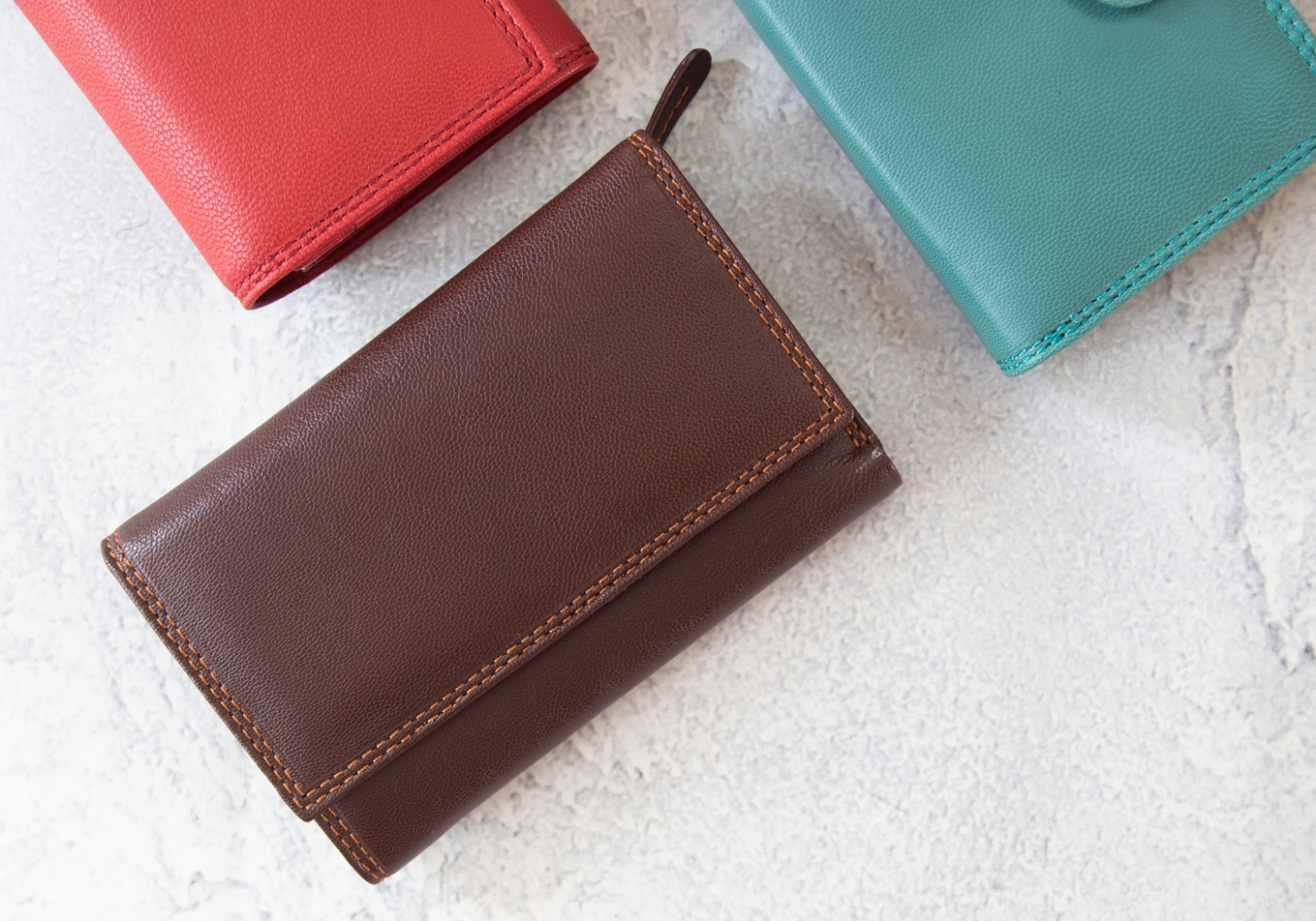 Nina is an elegant collection of Italian-made accessories from small wallets and cosmetic bags to handbags and clutches. They are available in a luxurious choice of colors. The perfect companion to carry wherever you go.