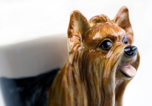 A pretty Blue Witch ceramic depicting the courageous and spirited Yorkshire Terrier. This feisty little breed hails from the north of England and is a working dog bred specifically for hunting vermin in factories.