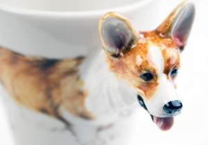 It is believed the Welsh Corgi is descended from Viking herding dogs. Known to be the pets of the English Monarchy they are said to make excellent companions. This lovely little dog is portrayed on a delectable ceramic by Blue Witch.