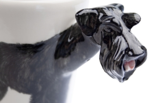 Featured here on this Blue Witch ceramic is the one and only, unmistakable Schnauzer. It has a unique and smartly distinctive look, with its compact, square build and beard. This adorable dog has its ancestral roots in the old guarding and herding dogs of Europe.