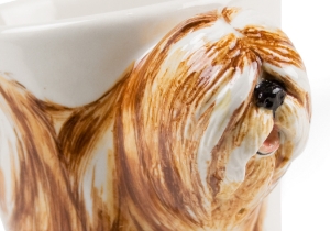 The Tibetan Terrier is not actually a terrier, it was so called by European travellers to Tibet. This gentle and affectionate breed is showcased on a ceramic from Blue Witch.