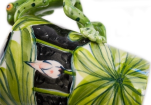 Friends of the Earth. A charming Frog perched on a unique Coffee Mug with exquisite background detail of a lily pad to give extra depth. Blue Witch brings this little creature to life.