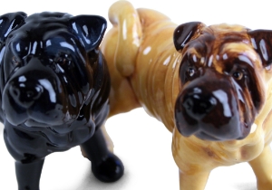 Originated in China where it was used as a fighting and guard dog. The Shar Pei is a truly distinctive looking dog with its deep wrinkles. Nowadays, the Shar-Pei makes a loving family dog. Beautifully depicted on a Blue Witch ceramic.