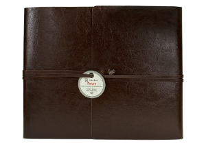 Representative of Tuscany in all its glory. The passion and skill of our Italian master craftsmen are utilised to produce the Tuscan collection, an environmentally friendly option which is still a fun yet glamorous choice. Specially developed by Italian expertise for LEATHERKIND ® Handmade in Florence using a new innovative technology: this natural recycled leather Guest Book has a smooth glossy finish which still allows for flexibility. A range of tasteful colours has been carefully selected; chocolate, burgundy, sky blue, black and red. These shade express are evocative of strength whilst remaining cheerful to look at. The envelope wrap style delivers an enduring, handsome look.