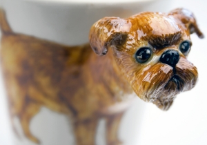 A jolly and unique Blue Witch coffee mug. This “monkey face” has made it all the way to Hollywood! The Brussels Griffon was the inspiration behind the creation of the Ewoks on Star Wars and a Griffon had a supporting role alongside Jack Nicholson in the film As Good As It Gets. The Brussels Griffon, also known as the Griffon Brucellosis in Europe, has an adorable appearance and has facial expressions that almost appear human!