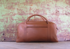 A timeless classic. Our Wayfarer leather messenger bag is the perfect, mature blend of traditional briefcase and the good old backpack. Handcrafted from high-quality calf leather. Our Wayfarer leather messenger bag is durable, reliable, and will let you multitask much easier. It’s even waterproof! Perfect for anyone; from a student to a busy professional. It can also be personalised making it the perfect finishing touch to your bag.