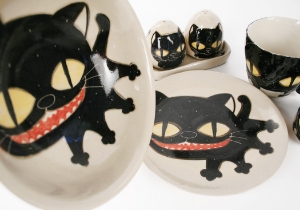 An eye catching feline takes the starring role on our Blue Witch Coraline ceramic collection.Each Cruet Set is ingeniously hand illustrated by a prolific artist. The canny brush strokes and cunning design create a curiosity with an air of mystery. Each piece is hand tooled to form a slightly eccentric asymmetrical shape. Visually and audibly theatrical whilst great for everyday use, dishwasher safe and microwave friendly to guarantee the colour will never fade.  It will also add a magical charm to a dinner party. Guaranteed to make the kids ‘Meow’ with delight and full of joie de vivre at any fun theme party!