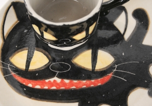 An eye catching feline takes the starring role on our Blue Witch Coraline ceramic collection.Each Plate is ingeniously hand illustrated by a prolific artist. The canny brush strokes and cunning design create a curiosity with an air of mystery. Each piece is hand tooled to form a slightly eccentric asymmetrical shape. Visually and audibly theatrical whilst great for everyday use, dishwasher safe and microwave friendly to guarantee the colour will never fade.  It will also add a magical charm to a dinner party. Guaranteed to make the kids ‘Meow’ with delight and full of joie de vivre at any fun theme party!