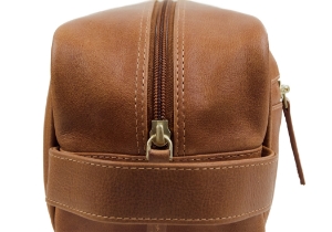 Rugged and refined. Designed for all your grooming needs with a spacious interior for all your toiletry essentials. The Wilson men's leather toiletry wash bag is handcrafted from high-quality calf leather. Tough, durable and water-resistant. It's got the room but is still compact enough to fit into any bag or suitcase.